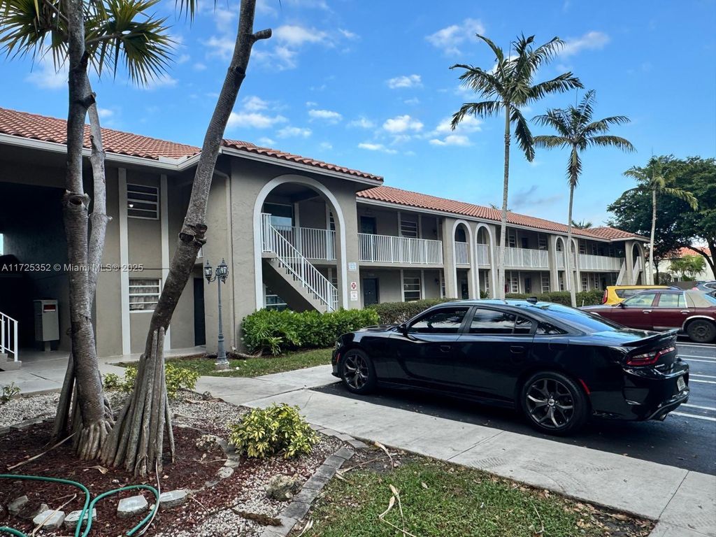 Photo of 11207 Royal Palm Blvd #11207, Coral Springs, FL 33065 (MLS # A11725352)