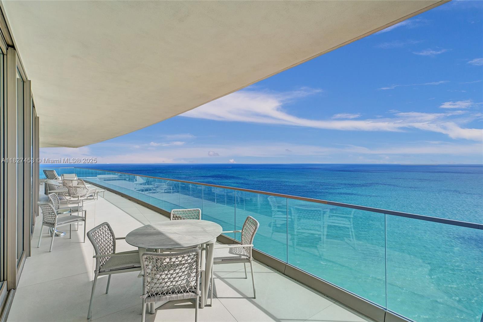 Experience luxury living at the prestigious Residences by Armani Casa with this stunning 4-bed/ 5.5-bath corner residence featuring nearly 90 ft of oceanfront terrace and wraparound balconies offering panoramic sunrise-to-sunset views. The thoughtfully designed layout includes a primary bedroom with direct ocean views and secondary bedrooms with ocean & bay views. Interiors by Armani’s Italian design studio feature Dada Armani kitchen cabinets, marble countertops, top-of-the-line Miele appliances, and exquisite Italian marble bathrooms. The building offers world-class amenities, including an on-site restaurant, beach and pool services, a state-of-the-art fitness center with cardio, weights, and Pilates equipment, and a luxurious spa with massage rooms, salon, and private treatment spaces