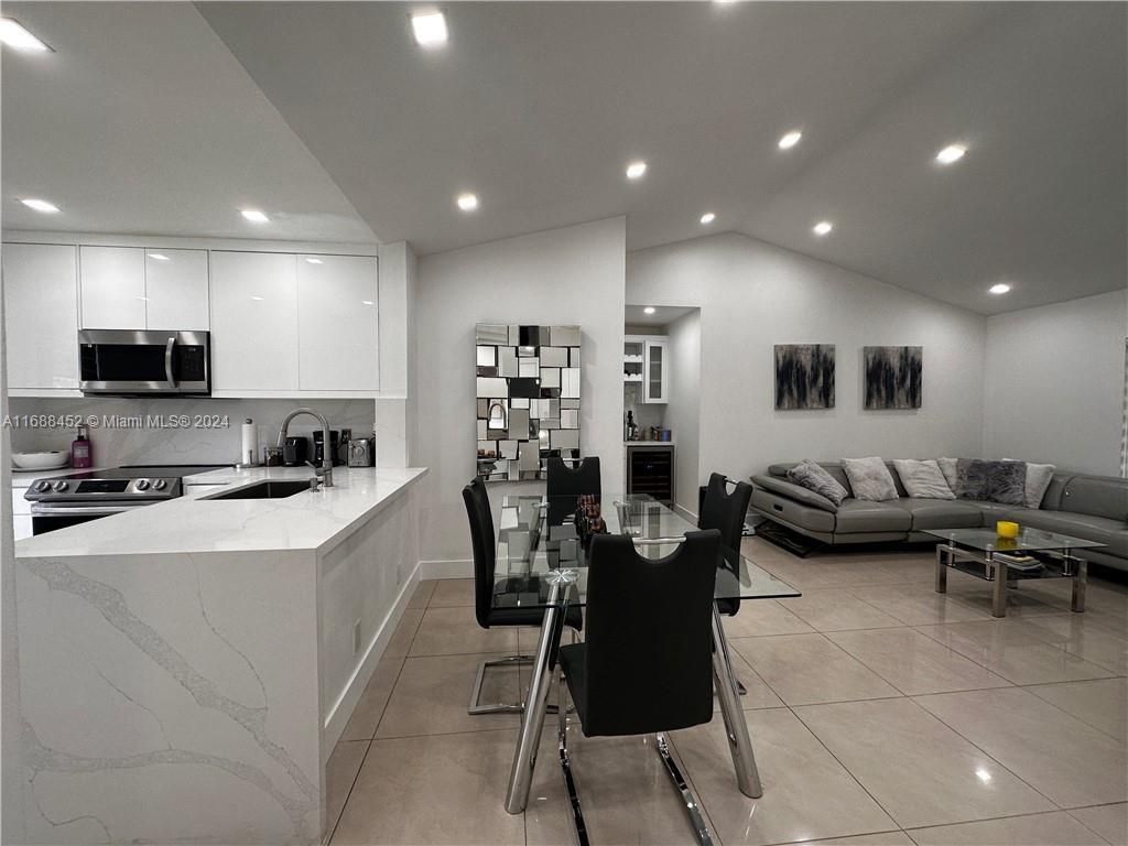 Photo of 5621 Riverside Dr #206A1, Coral Springs, FL 33067 (MLS # A11688452)