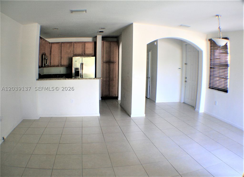 Photo of 202 Las Brisas Cir, Sunrise, FL 33326 (MLS # A12039137)