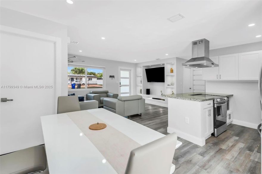 Beautifully Remodeled 3BR/2BA single-family home in desirable Hollywood location! This move-in-ready gem features brand-NEW waterproof vinyl flooring, a NEW AC system, impact windows and doors, updated electrical throughout, and Natural Gas for added efficiency. Enjoy a sleek kitchen with stainless steel appliances and a beautifully redesigned primary bathroom. Newly built closets provide added storage, and the roof is just 3 years old! Spacious side yards offer ample room to park a boat, RV, or truck. With a functional layout and complete privacy, this home is perfect for family living. Ideally located near major highways, shopping, dining, and just minutes from the beach. A must-see blend of style, comfort, and location!