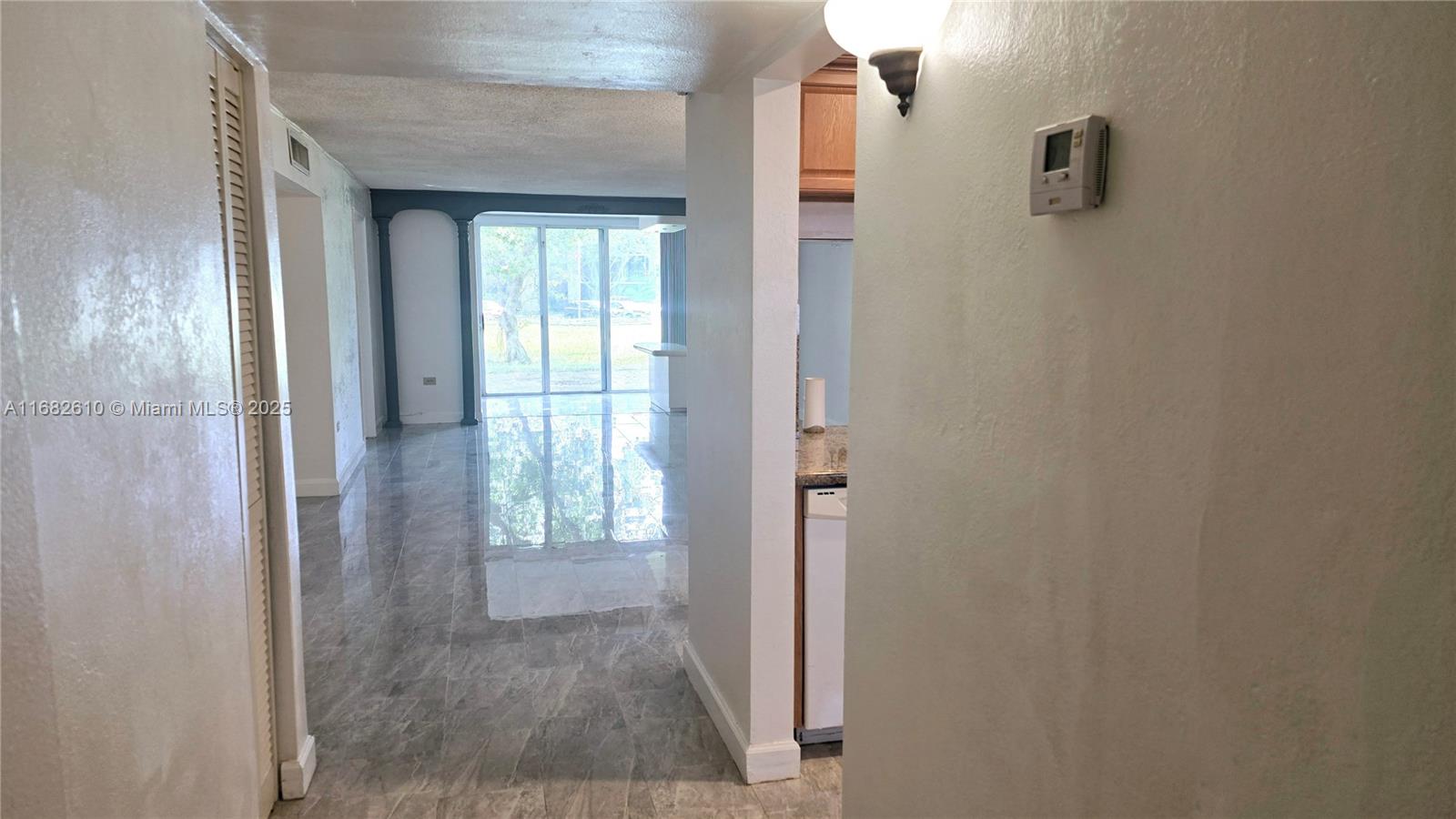 What an opportunity to own a 1,500 soft upgraded FIRST FLOOR condo with patio space and no neighbors behind! This 2 bedroom 2 bath condo in Royal oaks has so much room you will may think its a house! Some upgrades have been done. Also, brand new refrigerator and new toilets.The location of Royal Oaks in the heart of North Miami near shopping, highways and schools! This beautiful unit has a wonderful paved outdoor space that can be enclosed with HOA approval for entertaining or just more living space. No renting the first 2yrs of ownership, no pets as well. The building has already started the process of the new roof and new paint.