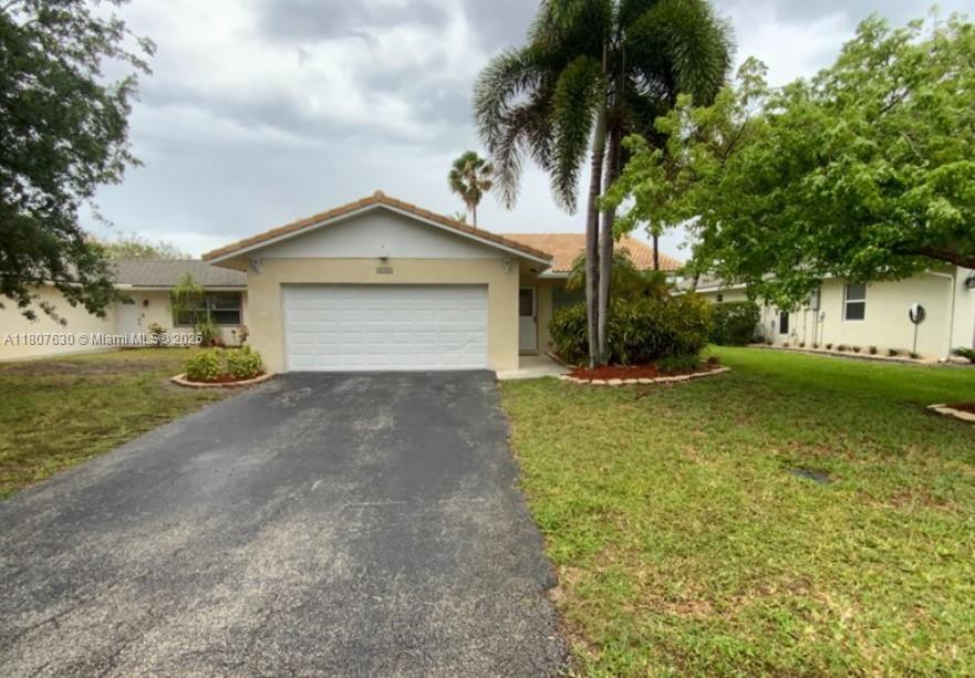 2731 Nw 123rd Ave, Coral Springs, Broward County, Florida - 3 Bedrooms  
2 Bathrooms - 