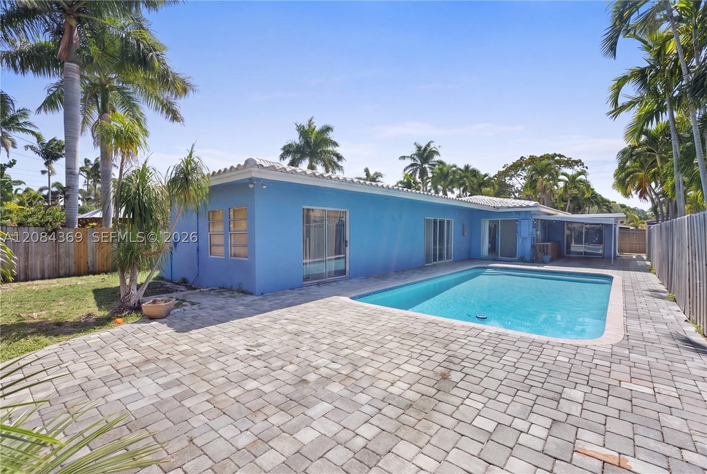 Photo of 1716 NE 17th Ave, Fort Lauderdale, FL 33305 (MLS # A12084369)