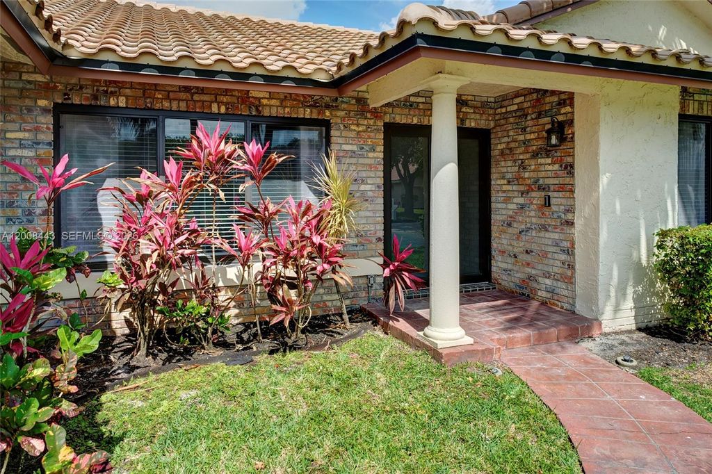 Photo of 1768 NW 97th Ter, Coral Springs, FL 33071 (MLS # A12008443)