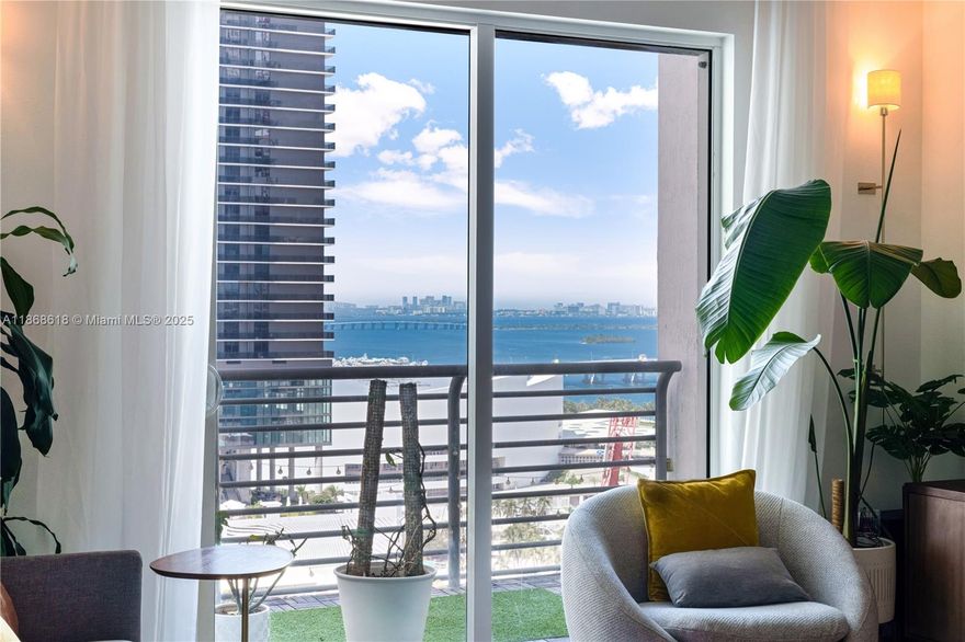 This stunning one-bedroom apartment features an open floor plan, offering a spacious living and dining area perfect for relaxation and entertainment. The owner has thoughtfully added a custom kitchen island, providing additional counter space and storage. The bedroom area is equally impressive, boasting ample closet space and room for a desk. Enjoy breathtaking views of the city and bay from the comfort of your own home. Strategically located just steps away from Miami Dade Community College, fine dining establishments, the Metro Mover, and the luxurious Waldorf Astoria Residences, this property offers the ultimate blend of convenience and luxury.