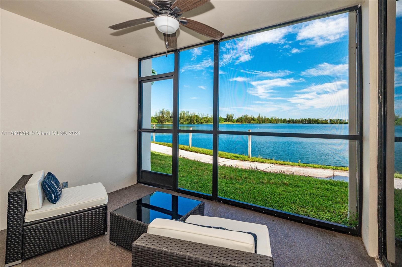 A breathtaking lake view awaits you in this lovely 2BR/2BA first floor unit offering direct walk-out access from your private screened balcony, ideal for entertaining or relaxing while enjoying the breeze. Unit has been tastefully updated and features a great layout with ample windows/sliding doors which allow tons of natural light to flow through. Resort-style living with access to 3 pools/hot tubs, a fitness center, a library, tennis, pickleball & basketball courts, along with a BBQ area for outdoor gatherings. Pet-friendly community. Currently undergoing renovations which will further enhance the appeal of the community. Only 15 minutes away from the airport and downtown Fort Lauderdale.