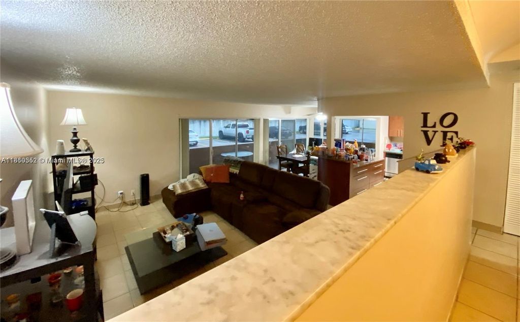 Photo of 4850 SW 63rd Ter #114, Davie, FL 33314 (MLS # A11860352)