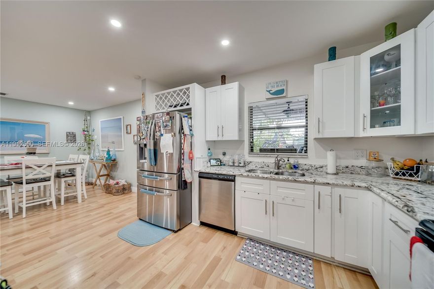 MOTIVATED SELLER .& OPEN TO CONCESSIONS ..Experience refined living in this impeccably updated 3-bedroom, 3-bath nestled in the heart of West Hollywood. From the moment you step inside, you’re greeted by light-filled interiors, sleek laminate flooring, and an open-concept layout designed for both style and comfort.

The expansive family room flows seamlessly into a designer kitchen showcasing granite countertops, custom cabinetry, and a generous island that invites effortless entertaining. Each bedroom is appointed with ample space and modern finishes, while the updated bathrooms offer spa-like tranquility.

Step outside to your own private tropical oasis — lushly landscaped grounds, an oversized covered patio, and a sparkling above-ground pool create the ultimate outdoor sanctuary for gatherings or quiet relaxation.