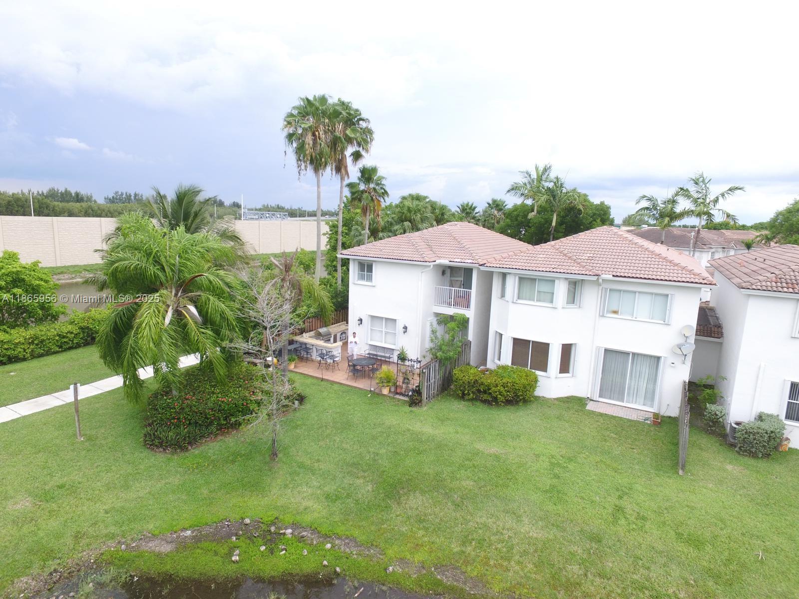 Beautiful fully furnished home with Natuzzi furniture and tasteful décor. It offers excellent privacy and space, with marble floors, wood on the stairs and upper level. Enjoy the garden furniture overlooking the lake and a spacious barbecue area.
This home is located in a small gated community with private security on 114th Ave. in Doral. Easy access to major roads such as the Turnpike, Palmetto, and 836. Just 8 minutes from Dolphin Mall and International Mall. You can walk to several parks or Eugenia B. Thomas School. Very close to excellent restaurants (La Fontana, Taikin, Graziano’s, Luka).