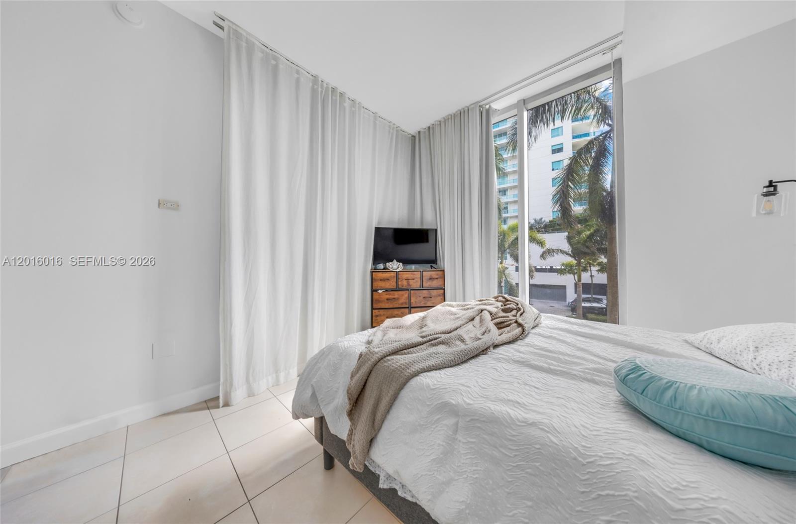 ELOQUENCE ON THE BAY COND - Residential Lease