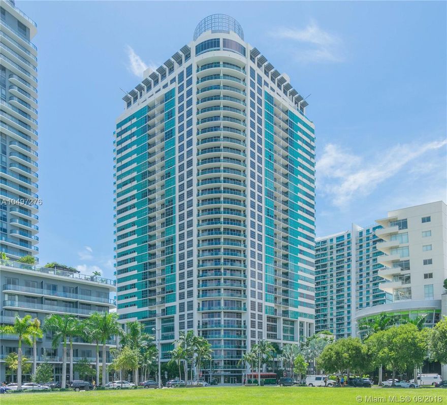 Beautiful unit facing design district w/large balcony, floor to ceiling windows. Italian kitchen w/SS appliances, stone countertops perfect for entertaining. Large walk-in closets; bedrooms next to each other. Midtown 4 is reminiscent of resort living with full service amenities, breath taking rooftop pool w/direct bay views, bbq grills, Jacuzzi, fitness center w/steam & sauna. Walk to shops, restaurants, bars & design district.