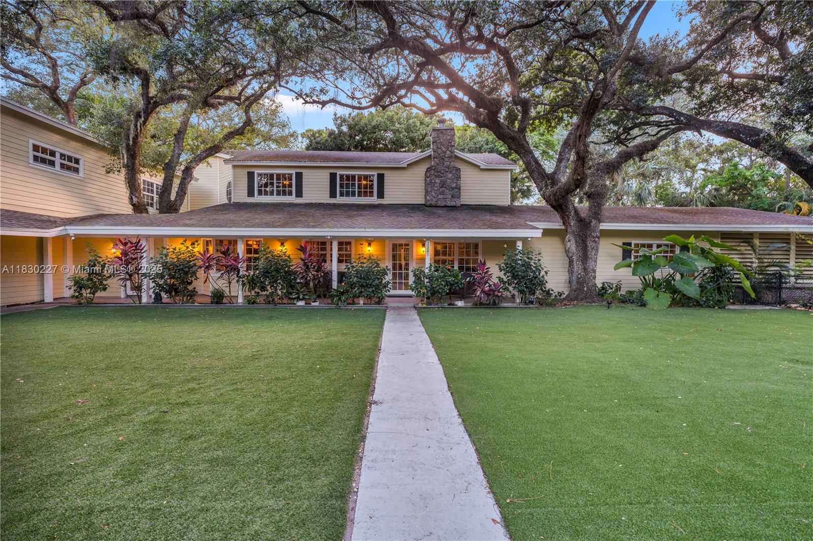 Welcome to your private retreat in the heart of Fort Lauderdale’s River Lands—where country charm meets modern luxury. This beautifully renovated estate sits on a 0.75-acre lot and offers over 6,000 sq ft of versatile living space. With 6 beds, 5 baths, plus a recreation room and separate 1BD/1BA in-law suite, it’s ideal for multi-generational living or income potential. Inside, you’ll find vaulted ceilings, real hardwood finishes, custom floors, and timeless character. The primary suite opens to a screened patio and features walk-in closets and a spa-like bath with an oversized tub and walk-in shower. The chef’s kitchen boasts a Sub-Zero fridge, large pantry, and coffee station. Enjoy outdoor living with a heated pool, summer kitchen, garden patio, sandbox, and space for your boat or RV.