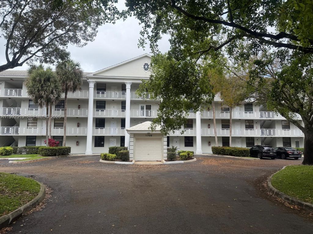 Photo of 1709 Whitehall Dr #103, Davie, FL 33324 (MLS # A11992519)