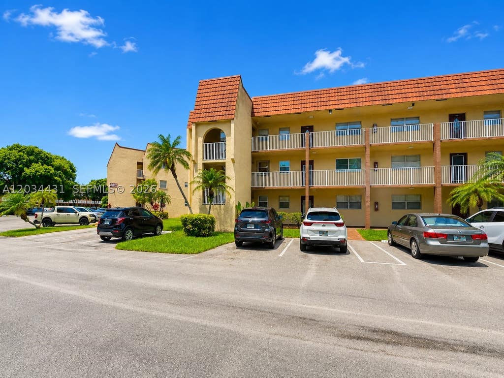 Photo of 2801 N Pine Island Rd #304, Sunrise, FL 33322 (MLS # A12034431)