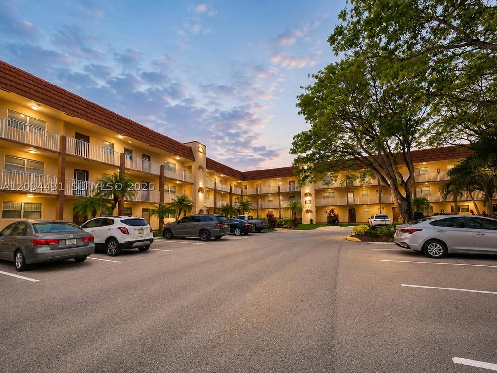 Photo of 2801 N Pine Island Rd #304, Sunrise, FL 33322 (MLS # A12034431)