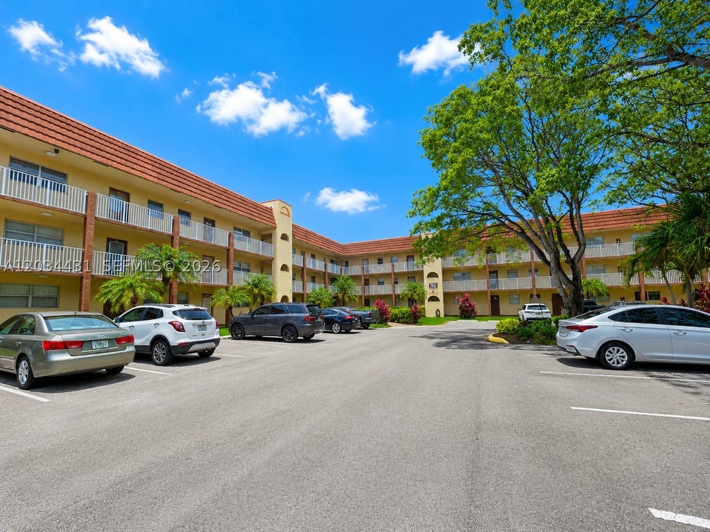 Photo of 2801 N Pine Island Rd #304, Sunrise, FL 33322 (MLS # A12034431)