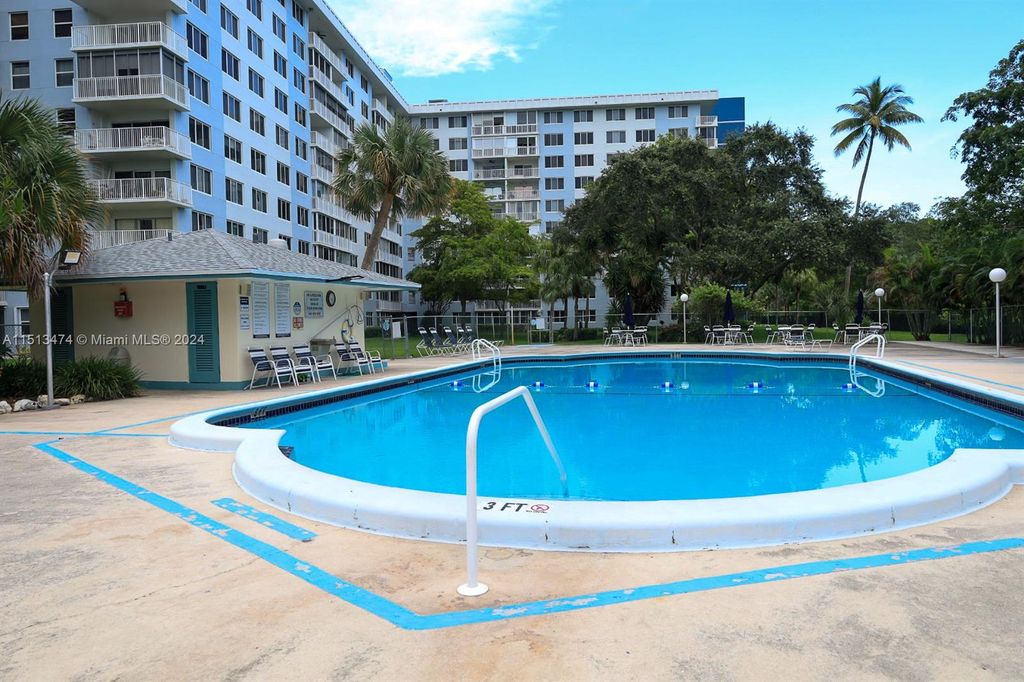 Photo of 4200 Hillcrest Dr #211, Hollywood, FL 33021 (MLS # A11513474)