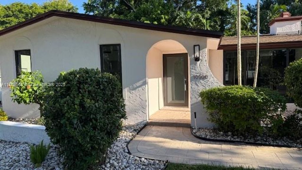 Photo of 10500 NW 2nd Ct, Plantation, FL 33324 (MLS # A11859665)