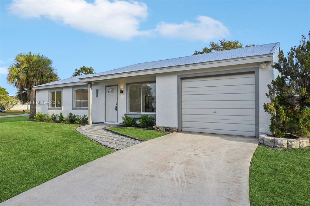 Photo of 337 SW Cherryhill Road, Port St Lucie, FL 34953 (MLS # A11933381)