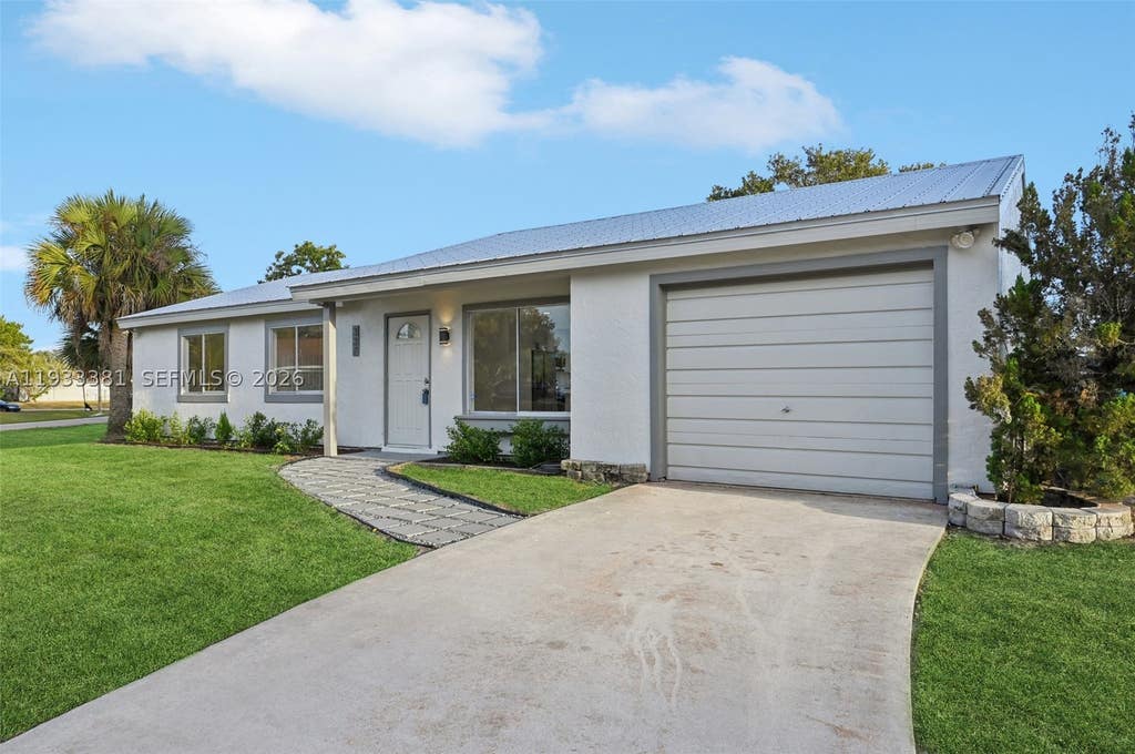 Photo of 337 SW Cherryhill Road, Port St Lucie, FL 34953 (MLS # A11933381)