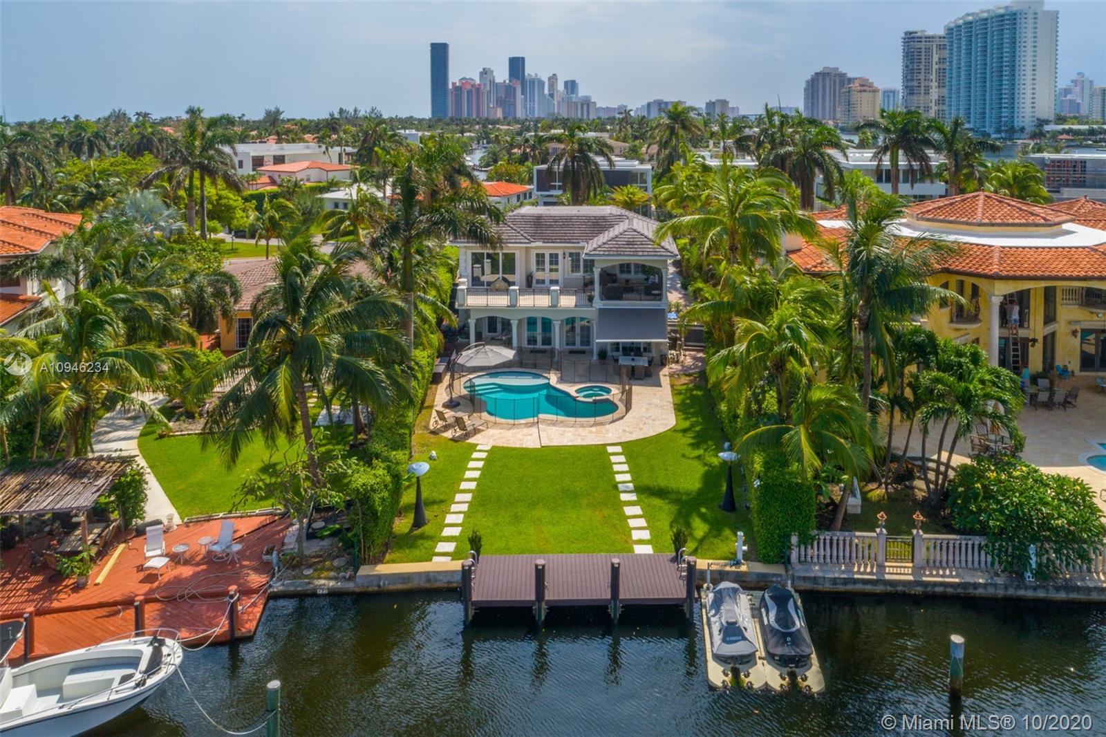 This turnkey Golden Beach chateau is primely located on the beautifully lush North Parkway, offering open water views and a deep backyard perfect for waterfront living. The home has been fully upgraded, boats 5 bedrooms, 5 bathrooms, 4,356 sq ft and the perfect balance of modern touches and warm finishes.