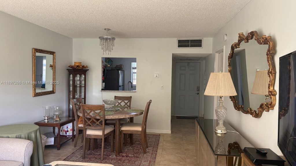 Photo of 5141 W Oakland Park Blvd #208, Lauderdale Lakes, FL 33313 (MLS # A11897266)