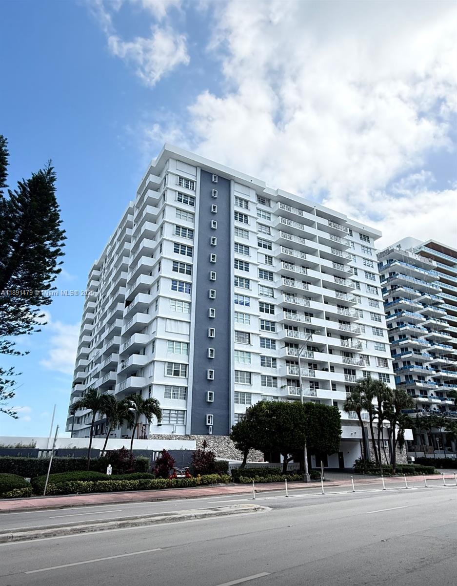 Millionaires Row, spacious 2/2 apartment. Building is oceanfront with all amenities. Beautiful remodeled large open kitchen, super spacious master bedroom with lots of closet space. Balcony has downtown and bay views with beautiful sunset views. Building is going though renovations. New party room, brand new pool with great areas, lobbies, hallways and doors. Apartment has new hurricane windows and sliding glass door. New shades and new A/C. Amenities include party room, gym, game room, storage, and a new pool soon. Covered parking and 24 Hr doorman. Lowest price unit with balcony. Price is firm.