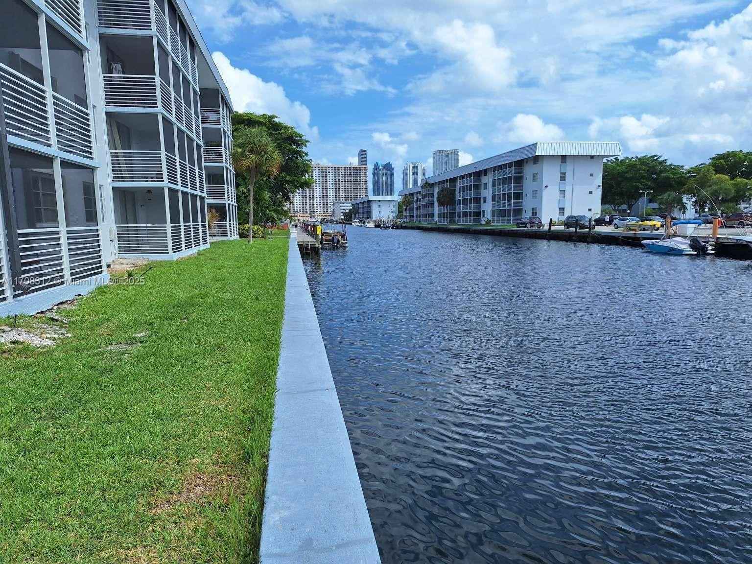 PRICE UPDATED! Fantastic opportunity! TOP Floor 1/1.5 condo offering beautiful canal view, newly renovated balconies & screened porch facing south perfect for enjoying meals at any time. Ideally located close to the Intracoastal Mall, beaches, retail centers, restaurants & houses of worship. Eden Isles community amenities include a clubhouse, heated pool, new gym, sauna, library, private storage, & laundry room. Maintenance covers structural insurance, water, cable, garbage, pest control, private dock available for rent. HOPA community, 12+ children welcome. The marina is a great addition for those who love boating. The new owner benefits are new roof, renovated parking lot, new seawall & building newly painted. No assessments, the building already Pass the 50 yr Re-certification. AS-IS.