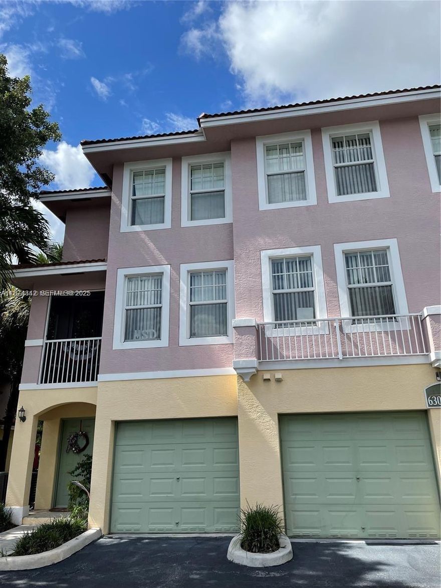 Resort-style living in gated Cypress Pointe! Bright 2BR/2.5BA two-story townhome with 1-car garage. Open living/dining, spacious kitchen with granite counters & stainless appliances, tile downstairs and wood/laminate upstairs, plus in-unit full sized washer/dryer. Community features clubhouse, fitness center, oversized pool, spa, kiddie pool, business room, playground & courts. Prime location near shopping, dining, parks & major highways. Fast access to Turnpike/Sawgrass. Association approval required.