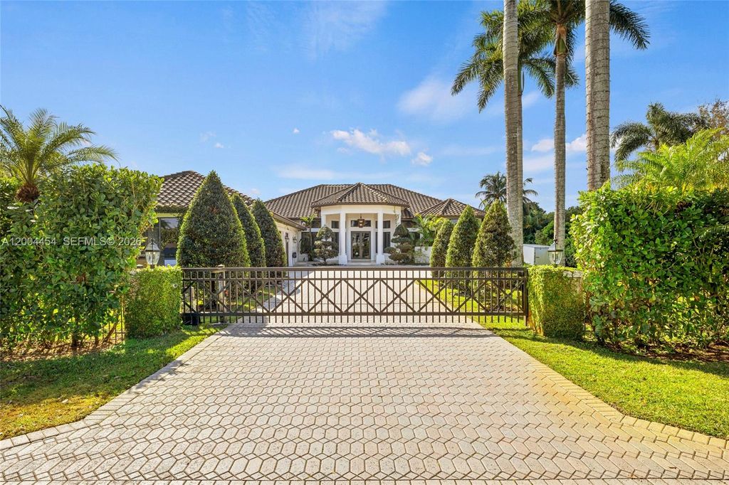 Photo of 12000 NW 11th St, Plantation, FL 33323 (MLS # A12004454)
