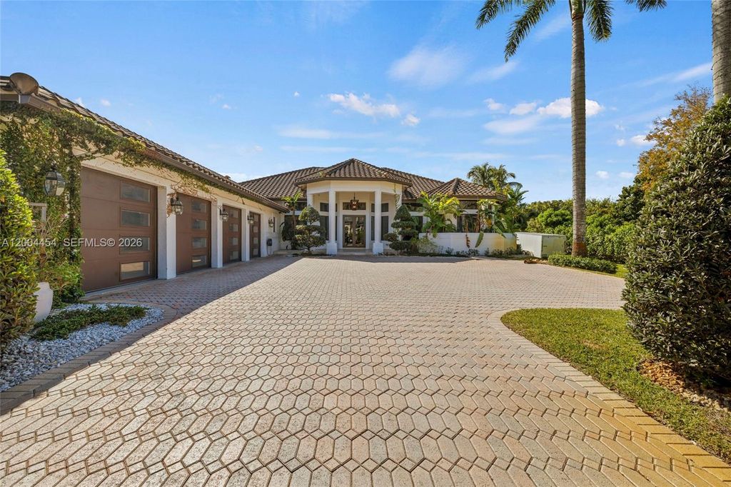 Photo of 12000 NW 11th St, Plantation, FL 33323 (MLS # A12004454)