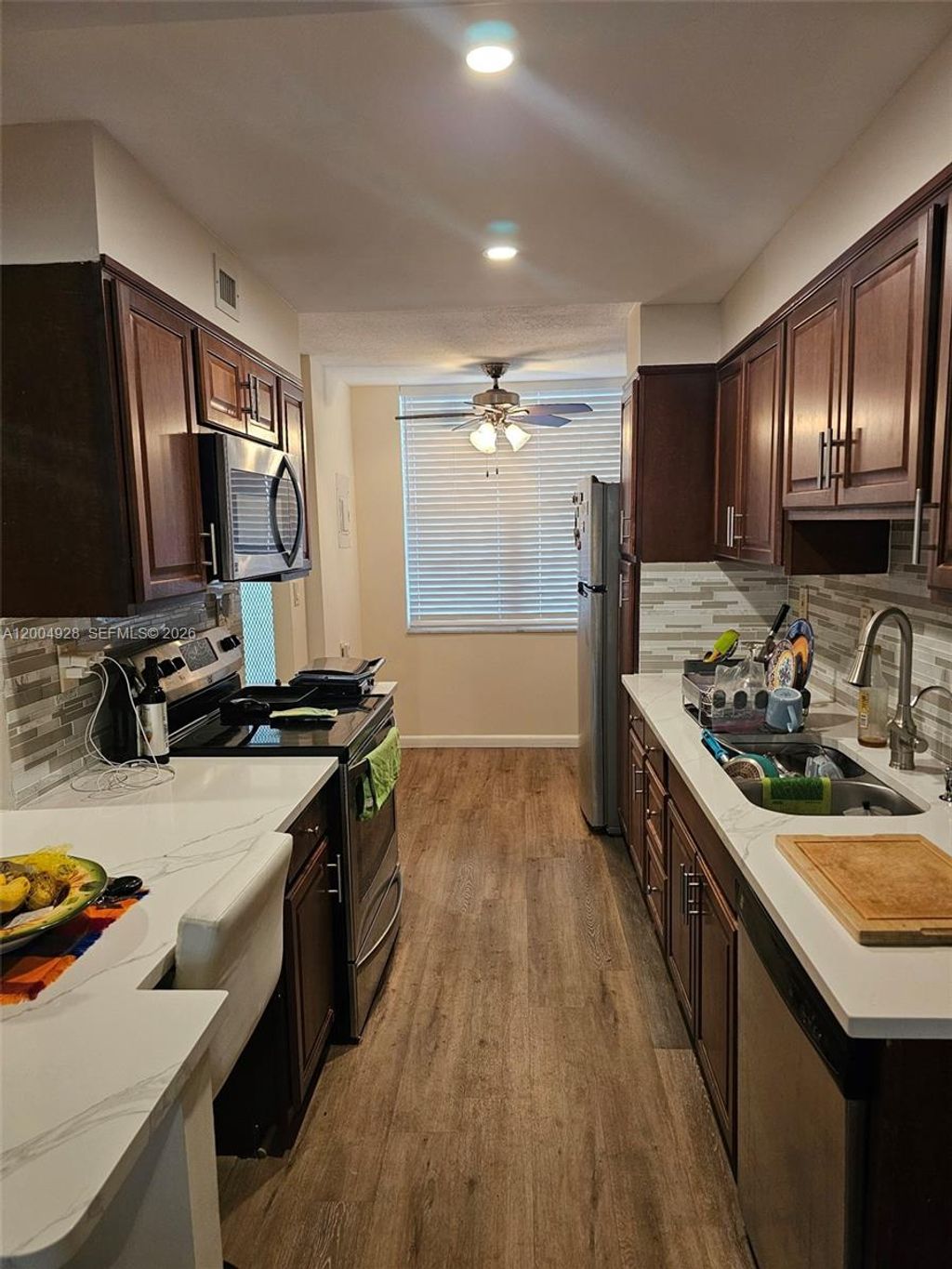 Photo of 2998 NW 48th Ter #432, Lauderdale Lakes, FL 33313 (MLS # A12004928)