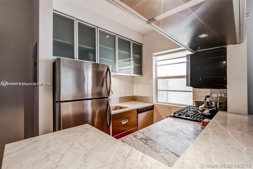 Rarely available! Beauitful apartment at Vanderbilt. Renovated building steps to the beach. Second floor apartment with high end finishes: Open kitchen with stainless steel appliances, gas stove, gorgeous Brazilian hardwood floors, walk in closet, Carrara marble bath/shower, Duravit fixtures, new central air conditioning, full size washer and dryer inside the apt, roller shades, hurricane impact windows. Blocks to the beach. Gated, safe and very well maintained building. Looking for great tenant! 1 year lease renewable. Water cold/hot, sewer included.  Vacant and easy to show!