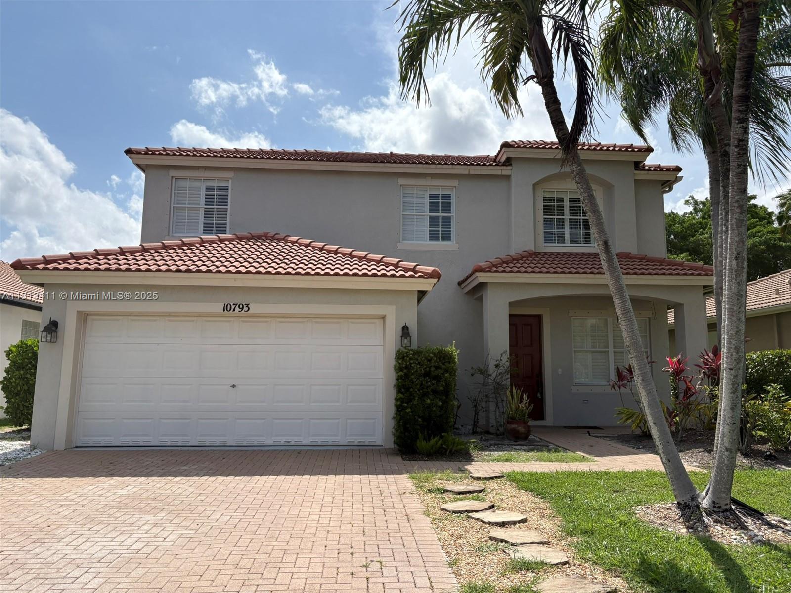 Enjoy the South Florida lifestyle with wide-open spaces, serene lake views and beautiful sunsets. Nestled on a cul-de-sac, this spacious home is perfect for entertaining, playing and relaxing lakeside. Build your pool oasis or fence your playground paradise. Five rooms offer picture windows w/ lake view! Other bonuses: plantation shutters, crown molding, double oven, inside laundry & newer HVAC. All this within the gated community of Wellington's Edge...3 community pools, 2 playgrounds, pickleball, tennis, basketball, fitness center, dog-friendly sidewalks & lakes for fishing. Just minutes to A-rated schools. Short term June to December.
