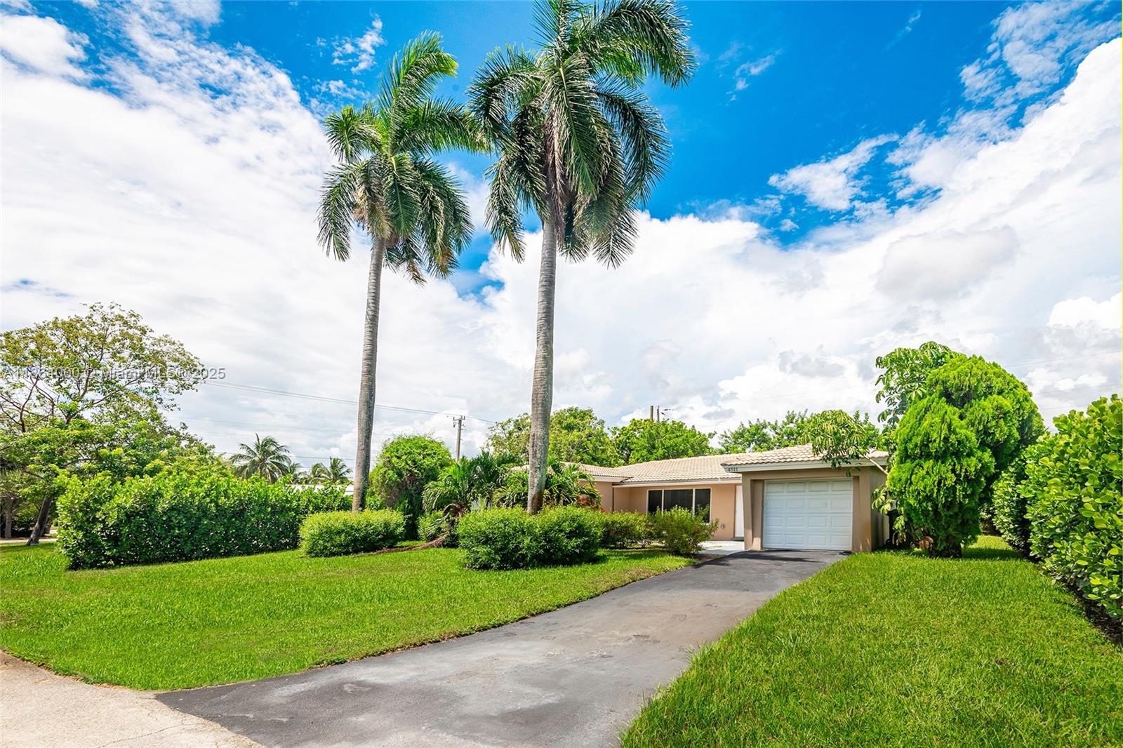 Renovated 3/2 pool home with a garage in the highly sought after neighborhood of Coral Heights. The tile roof is 10 years old, and everything else has been renovated within the last 2 years, which includes impact windows/doors, AC, plumbing, electric, and appliances. Excellent home in a wonderful neighborhood, close to the beach, shopping, and A+ rated schools!