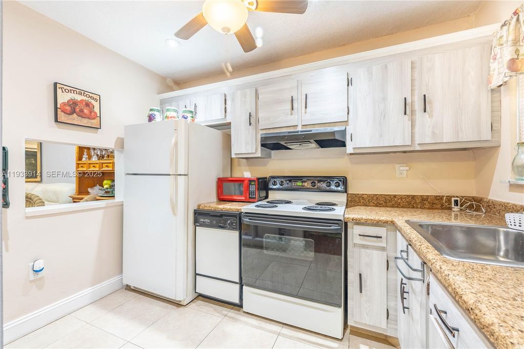 Photo of 2811 N Pine Island Rd #309, Sunrise, FL 33322 (MLS # A11933914)