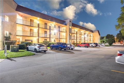 Photo of 2811 N Pine Island Rd #309, Sunrise, FL 33322 (MLS # A11933914)