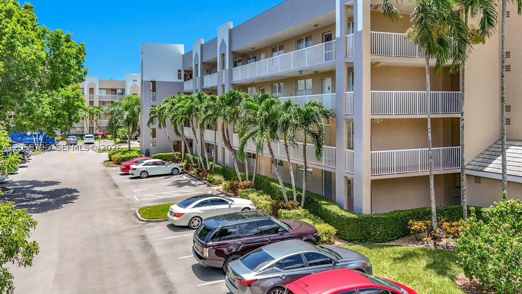Photo of 10208 NW 24th Pl #205, Sunrise, FL 33322 (MLS # A12058796)