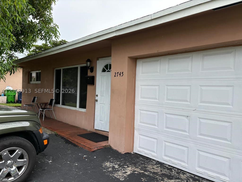 Photo of 2745 NW 69th Ave, Sunrise, FL 33313 (MLS # A12068913)