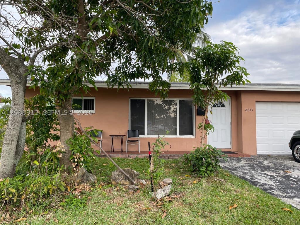 Photo of 2745 NW 69th Ave, Sunrise, FL 33313 (MLS # A12068913)