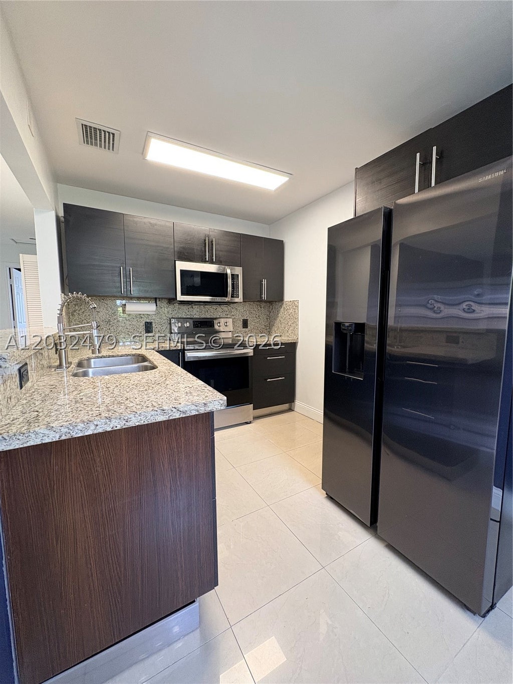 Photo of 1116 N 61st Ave #1, Hollywood, FL 33024 (MLS # A12032479)