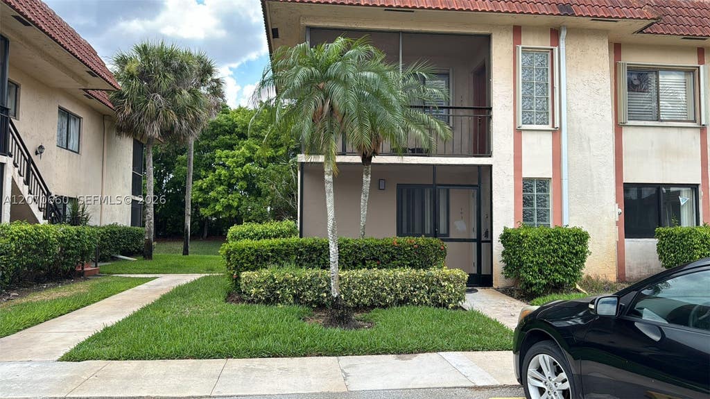 Photo of 331 Lakeview Dr #101, Weston, FL 33326 (MLS # A12070660)
