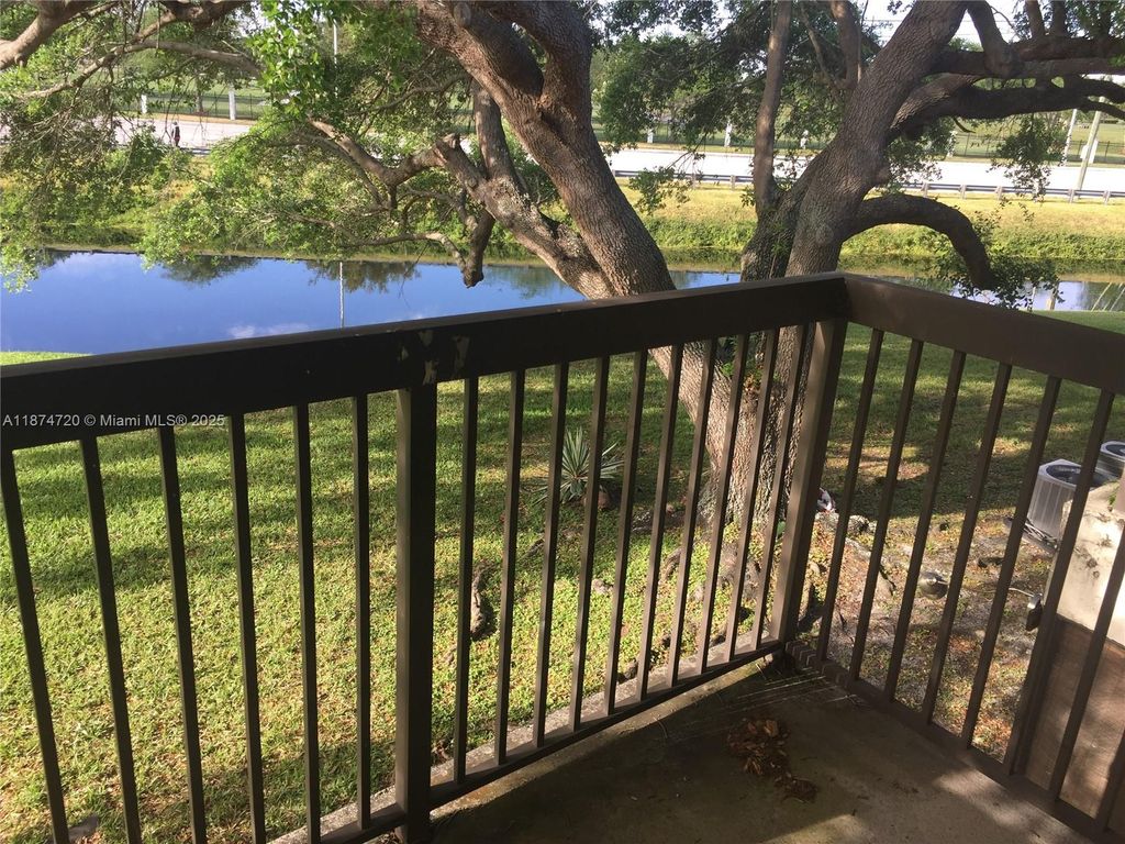 Photo of 6061 Shakerwood Cir #205, Tamarac, FL 33319 (MLS # A11874720)