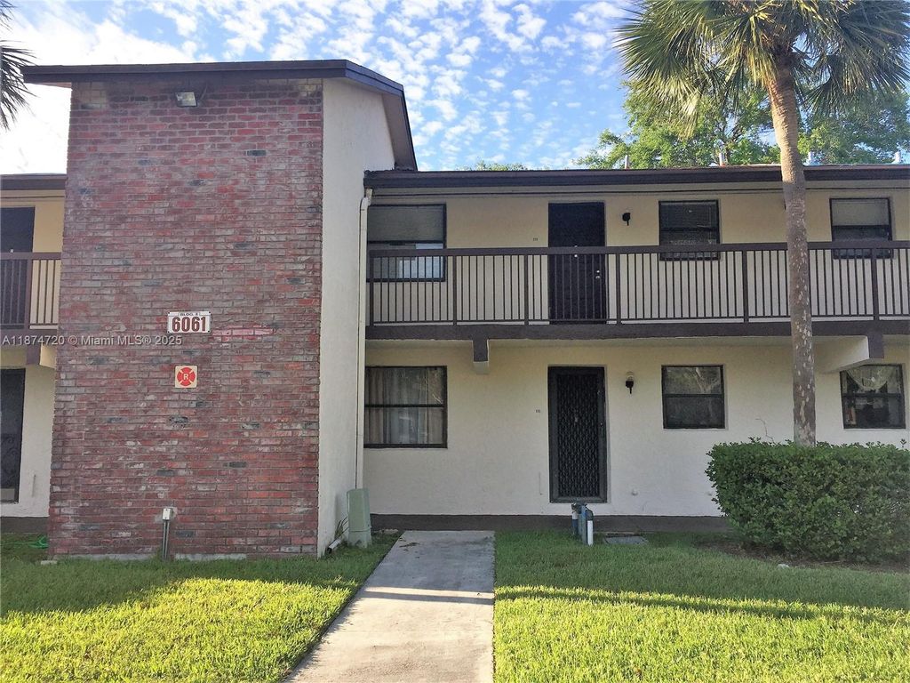 Photo of 6061 Shakerwood Cir #205, Tamarac, FL 33319 (MLS # A11874720)