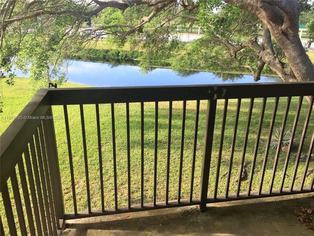 Photo of 6061 Shakerwood Cir #205, Tamarac, FL 33319 (MLS # A11874720)
