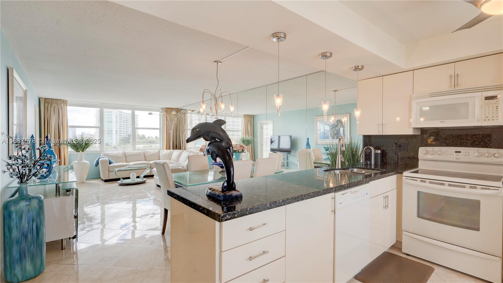 2/2 REMODELED UNIT OFFERED TURNKEY AND DESIGNER FURNISHED AND DECORATED. OPEN KITCHEN WITH SLEEK KITCHEN CABINETS AND GRANITE COUNTER TOPS. VIEWS OF OCEAN, INTRACOASTAL AND CITY SKYLINE. UPDATED BATHROOMS. MURPHY BED IN GUEST BEDROOM. NEWER A/C, HOT WATER HEATER AND ELECTRIC PANEL. HURRICANE IMPACT WINDOWS AND DOORS AS WELL AS HURRICANE SHUTTERS ON BALCONY. COVERED PARKING. STEPS FROM SANDY BEACH AND IDEALLY LOCATED FROM NEWLY REDEVELOPED ATLANTIC PIER, SHOPS, CAFES, RESTAURANTS. AMENITIES INCLUDE POOL, BBQ AREA, EXTRA STORAGE. SEPARATE EXTERIOR A/C ROOM. GRANADA HOUSE HAS COMPLETED THE CONCRETE RESTORATION. LAUNDRY ROOM ON EVERY FLOOR.