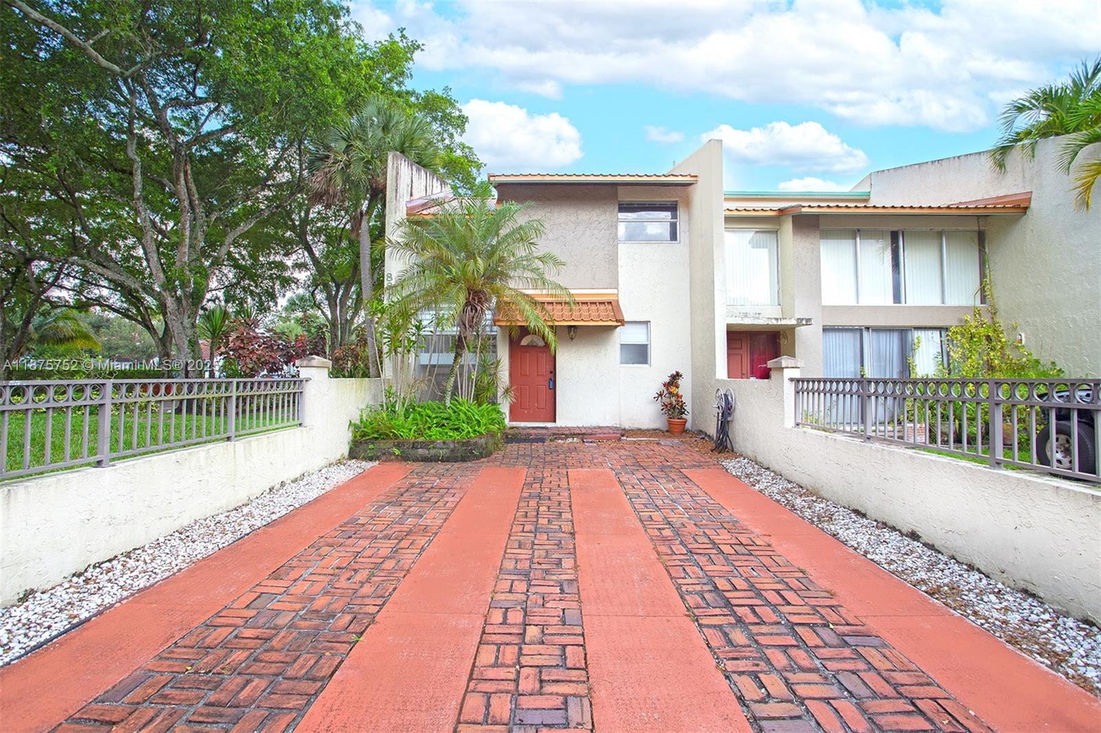 Spacious Corner Townhouse with 2 beds, 2.5 baths in the heart of Plantation, with an open concept layout in the living-dining area. Additional Office Room downstairs. Both bedrooms offers extra space, large closets and storage. Newer roof 2019, and newer tank less Water Heater 2023. The kitchen has been updated with a snack area for extra seating. Jacaranda Country Club, and the great amenities in the community. Conveniently located near shopping, dining, highways, and Ft Lauderdale Airport.