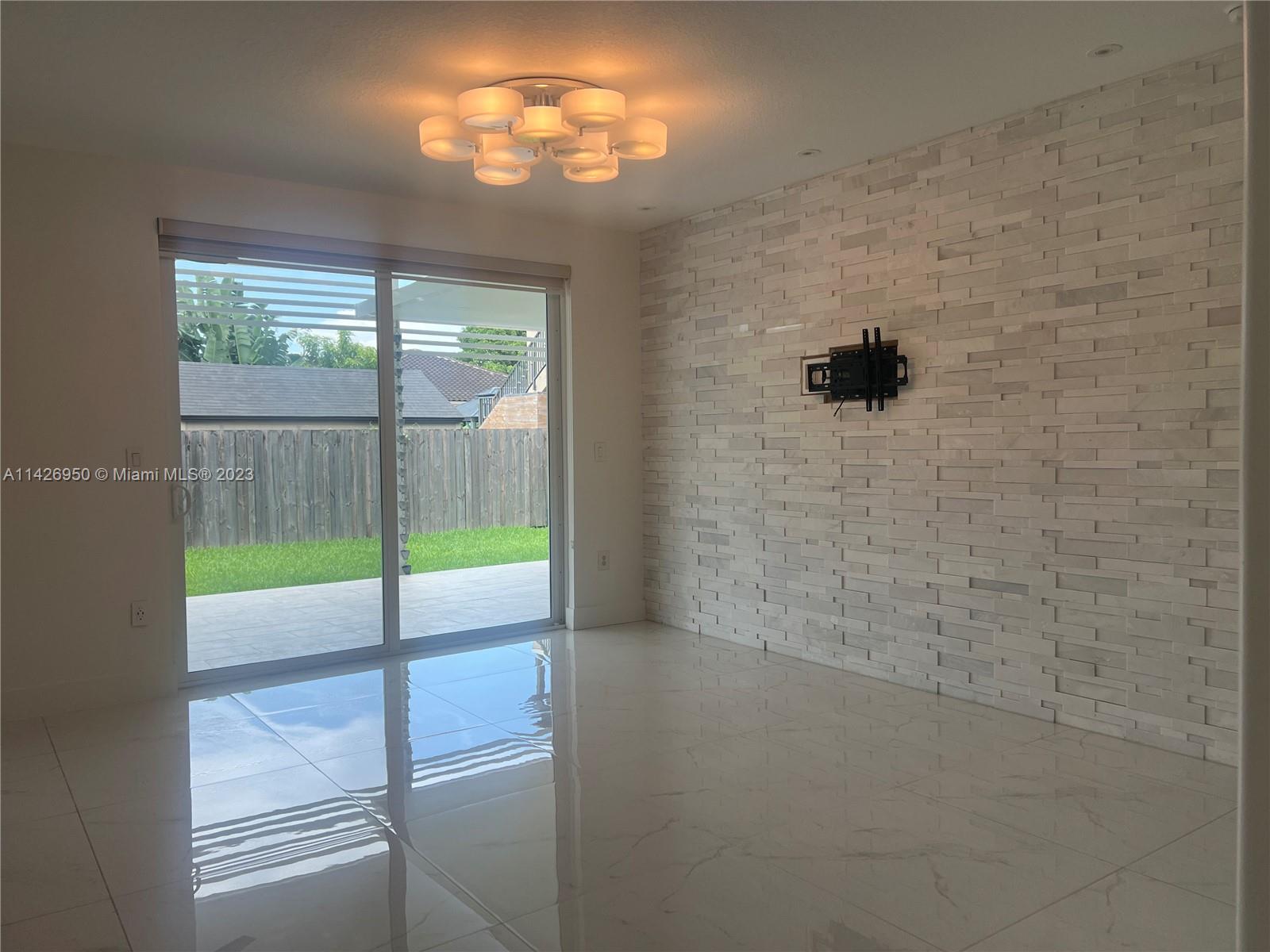 Beautiful and spacious house 4 bedrooms, 3 full bathrooms, 1 bed/1 bath are located on the first floor, impact windows, eat in kitchen, stainless steel appliances, 1st floor was recently renovated. Nice patio with pergola, perfect for entertaining family and friends. ***No dishwasher available, garage opens manually***