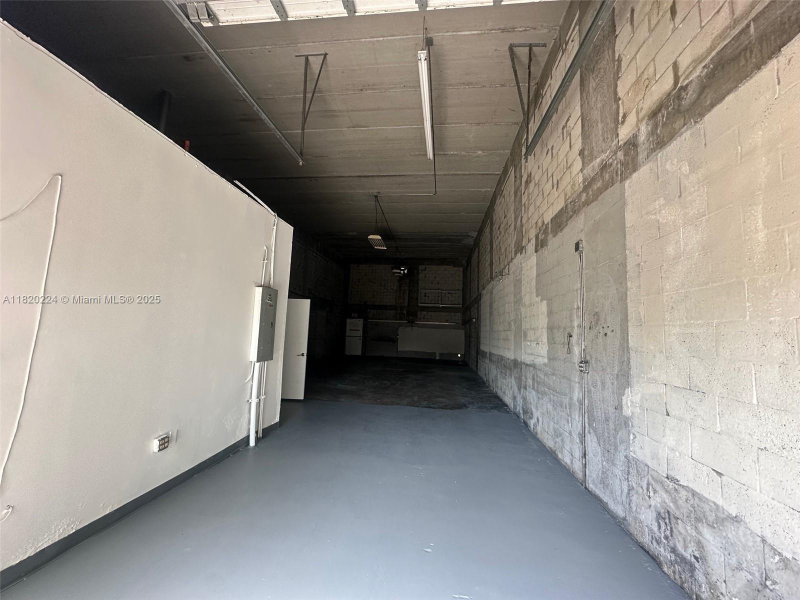 READY TO MOVE IN ASAP. 1538 sf warehouse with office. corner unit. 3 parking spaces. near Tamiami airport. first month and 2 deposits to move in. price does not include 3% sales tax. unit is currently being cleaned and painted. updated photos coming soon. NO MECHANICS.